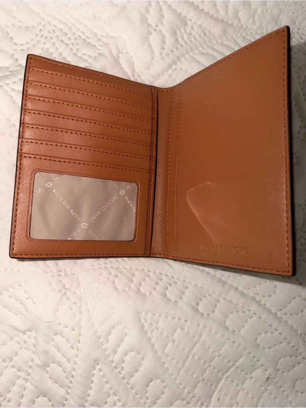 Michael Kors Brown Monogram Passport Cover with Gold Logo